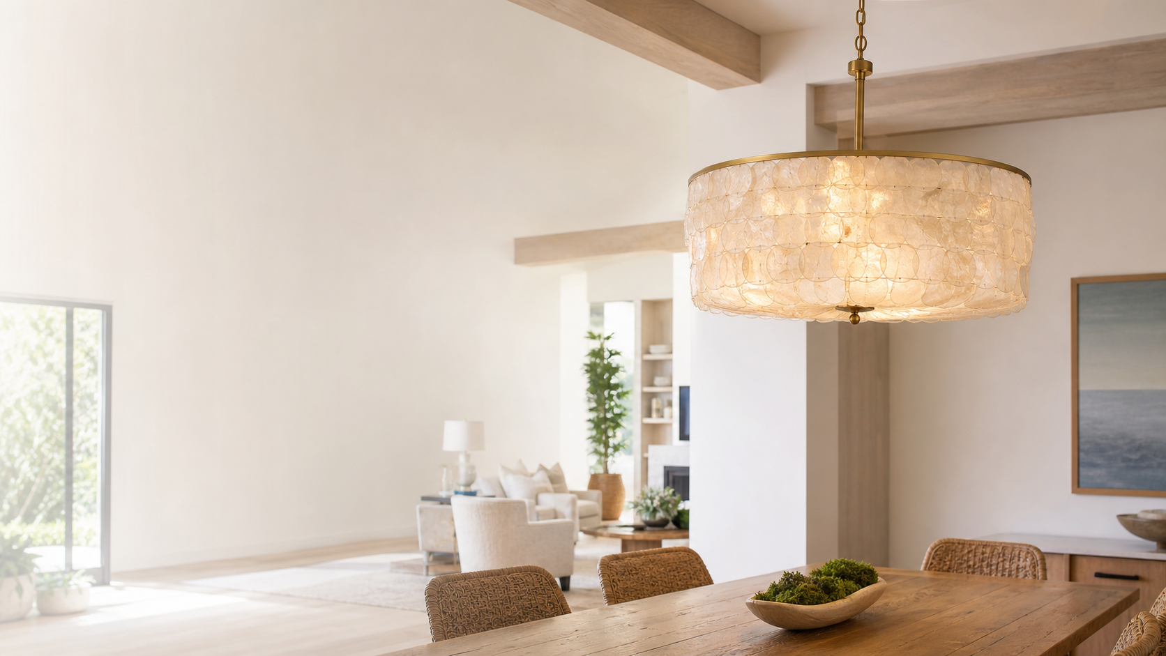 Warm modern dining room with a glowing Hushwing chandelier